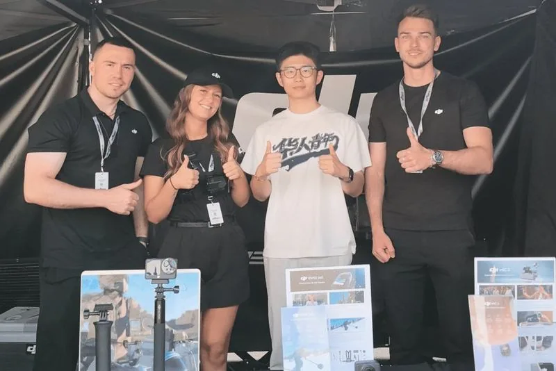 Solectric team on the DJI stand at the Sachsenring MotoGP