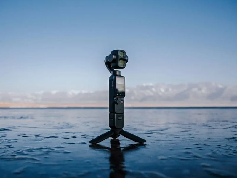 DJI Osmo Pocket 4P on a tripod by the water